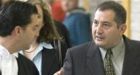 Man acquitted of killing officer suing police